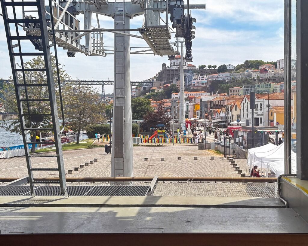 From the base of Vila Nova de Gaia, the cable car offers a dramatic ascent over one of Portugal’s most storied landscapes. Just steps away f